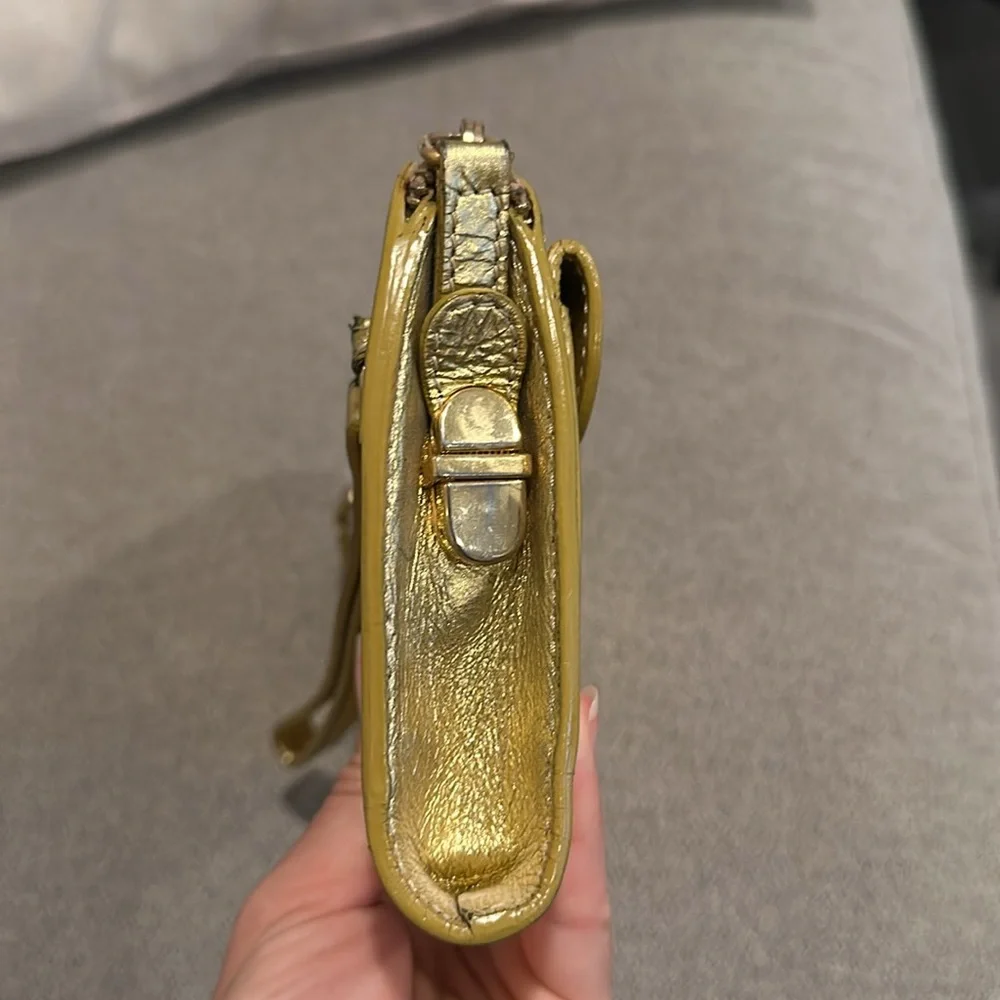 Sigerson Morrison gold wristlet/clutch